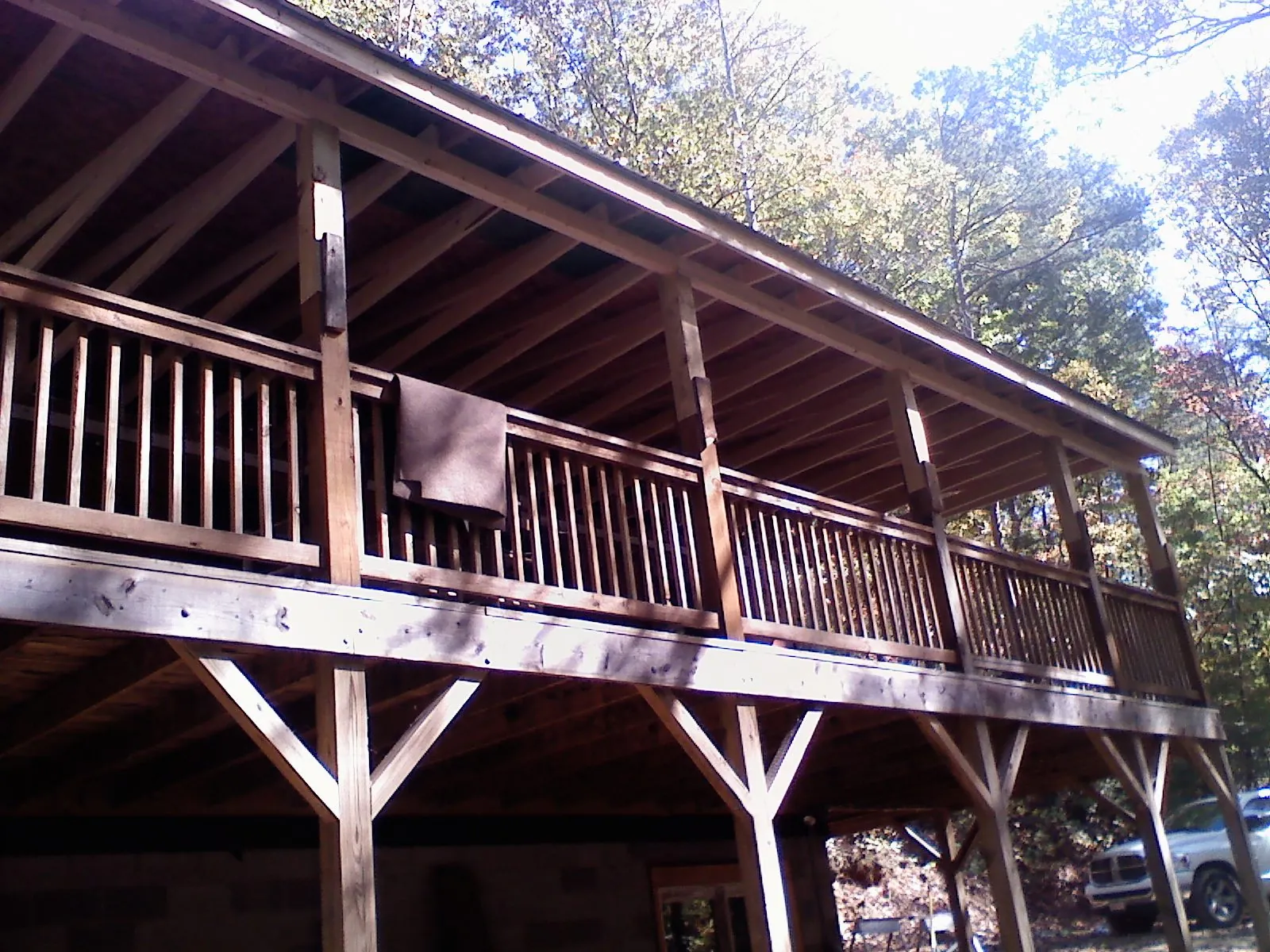 Timber framing under a new elevated porch and deck — Roof Leak Repair in Satellite Beach by Roofing Brothers